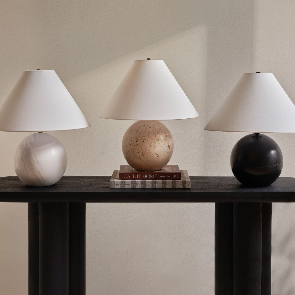 Assen table lamp by Renwil, travertine base, ivory linen shade, honed natural stone