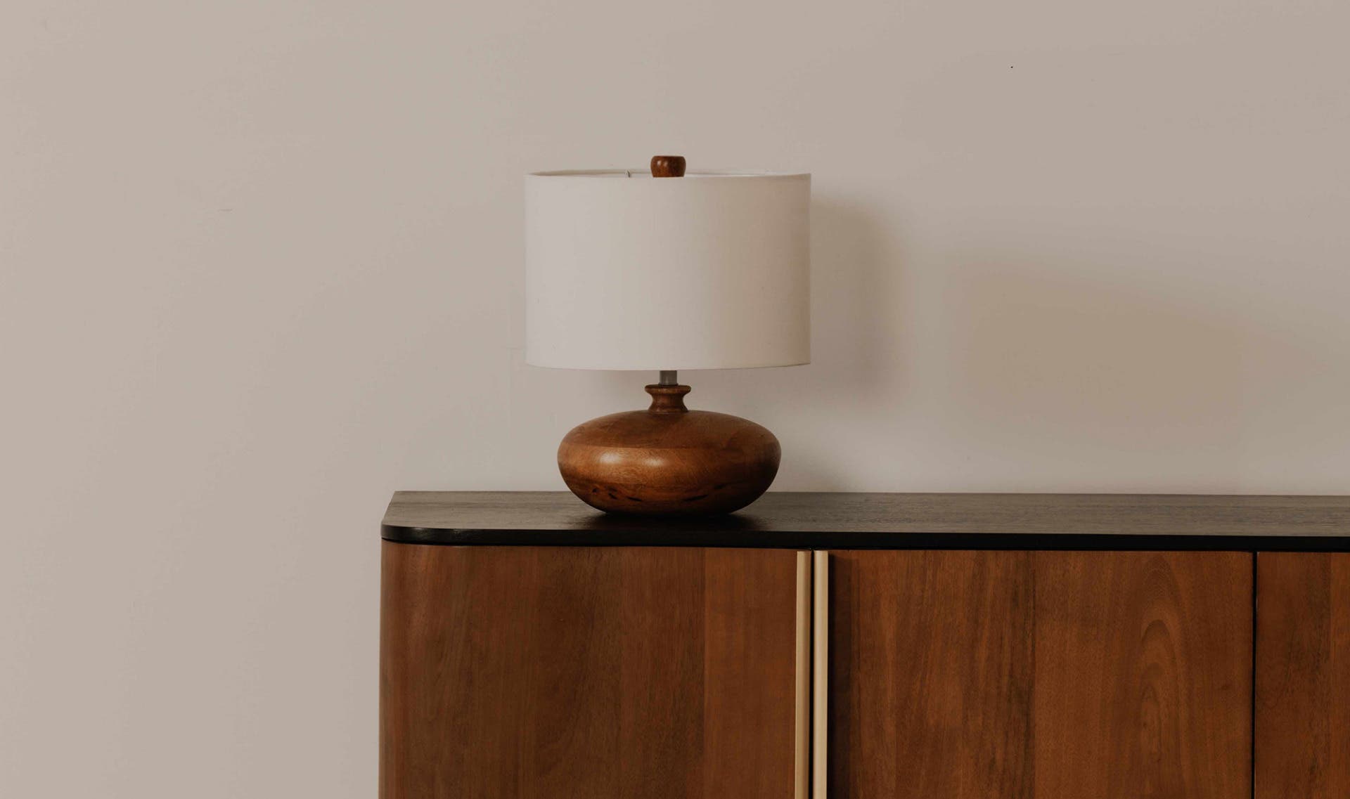Evie table lamp by Moe's Home Collection, honey brown turned wood base, tapered shade