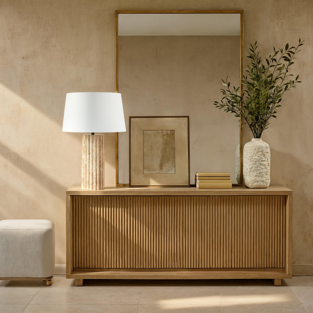 Milena table lamp by Renwil, travertine column base, ivory linen shade, fluted stone
