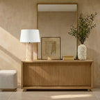 Milena table lamp by Renwil, travertine column base, ivory linen shade, fluted stone