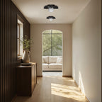 Myrtos wall sconce by Renwil, black marble, dark bronze finish