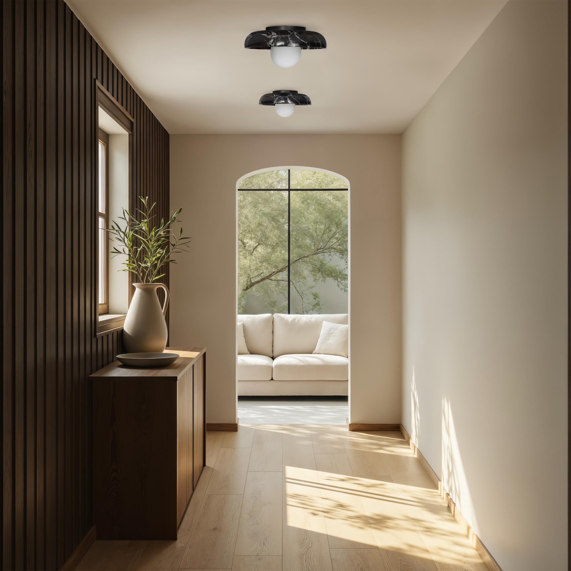 Myrtos wall sconce by Renwil, black marble, dark bronze finish